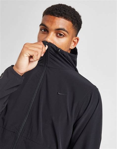 black Nike unlimited woven jacket